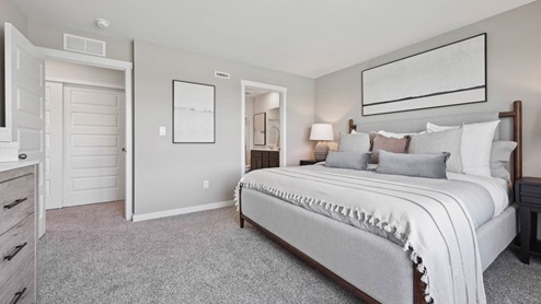 Primary bedroom with connecting ensuite