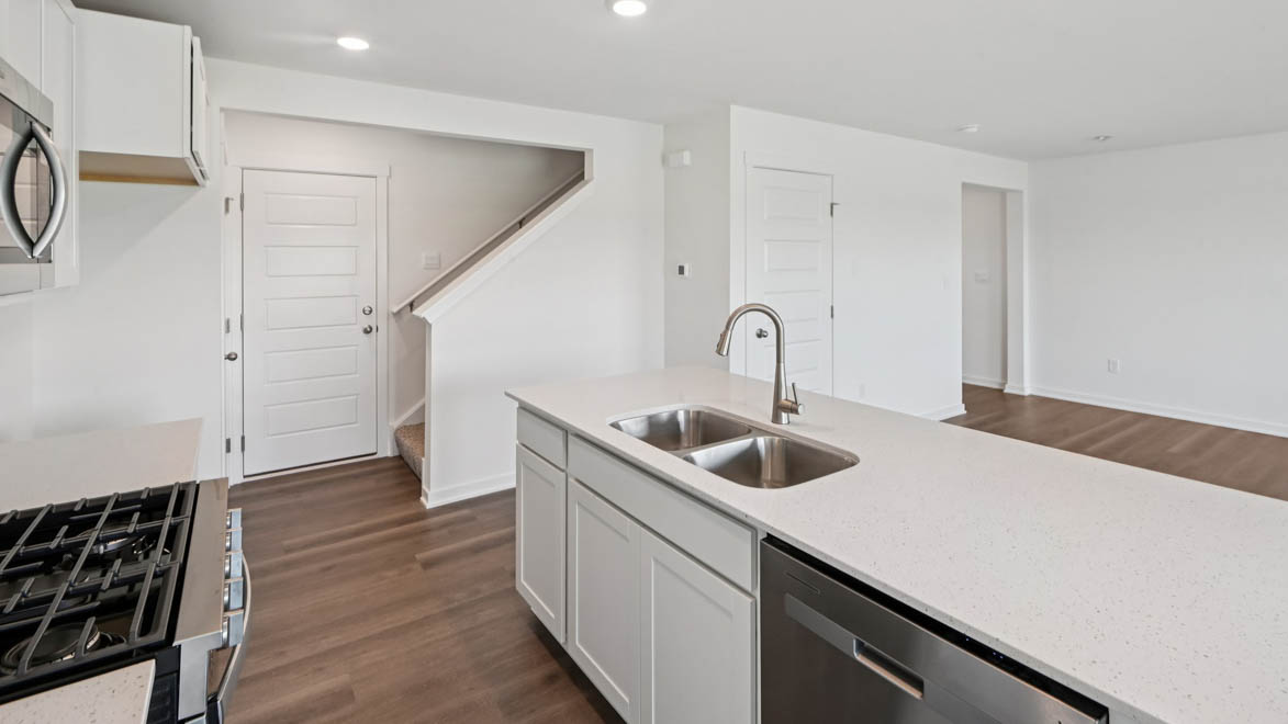 Large kitchen island overlooking great room