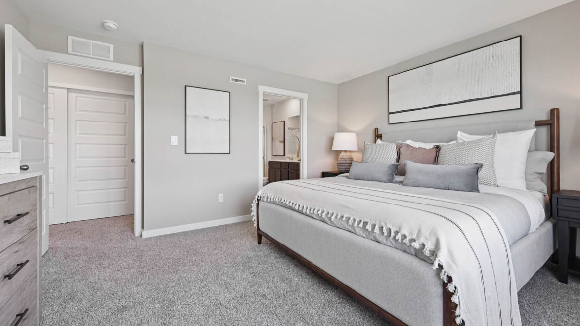 Primary bedroom with connecting en suite