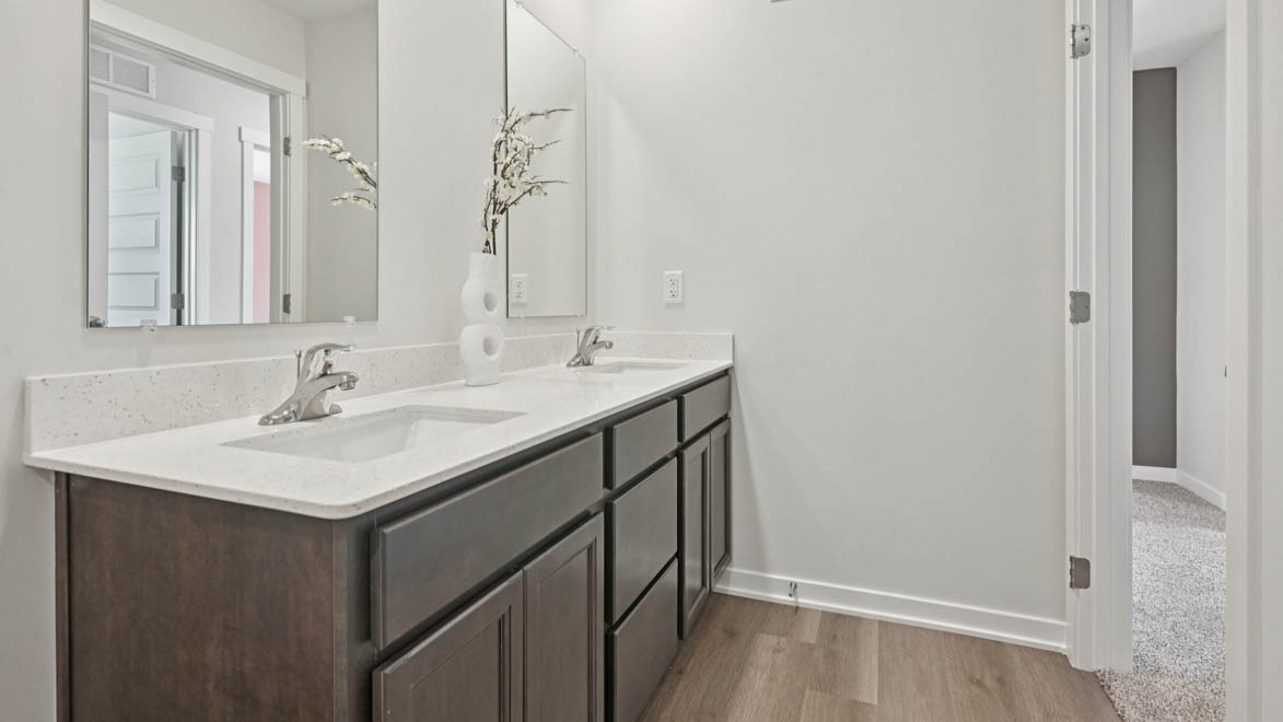 Secondary bathroom with dual sinks