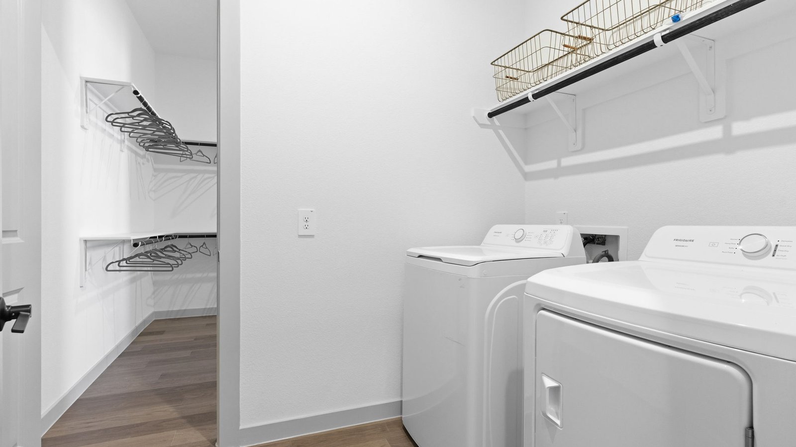 Spacious utility room connected to the primary closet