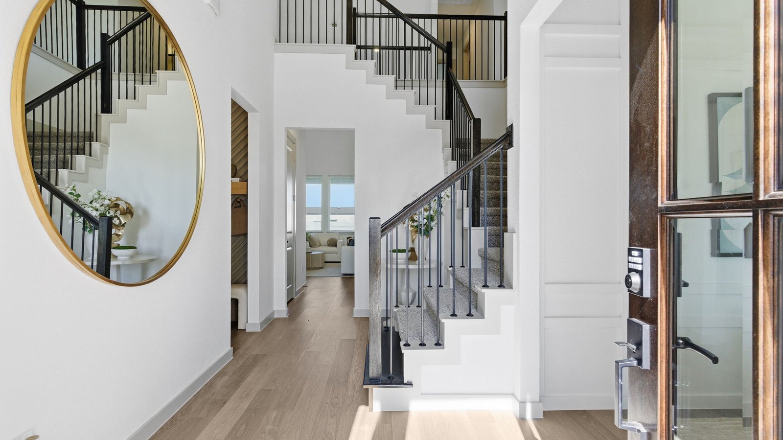 A welcoming foyer opens into a bright, open-concept living space