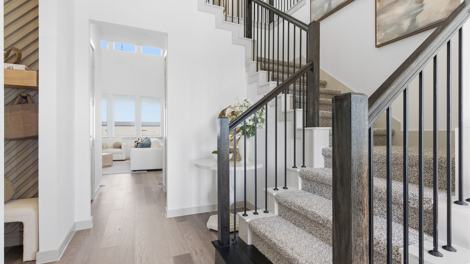 A welcoming foyer opens into a bright, open-concept living space