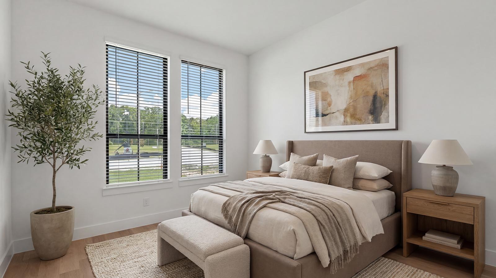 Stagged secondary bedroom with large window