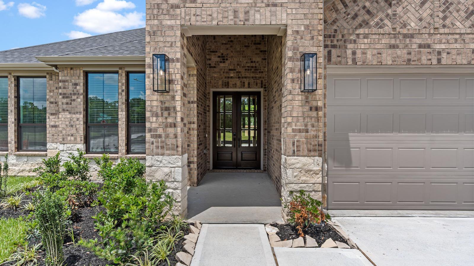 single story home with a three car garage