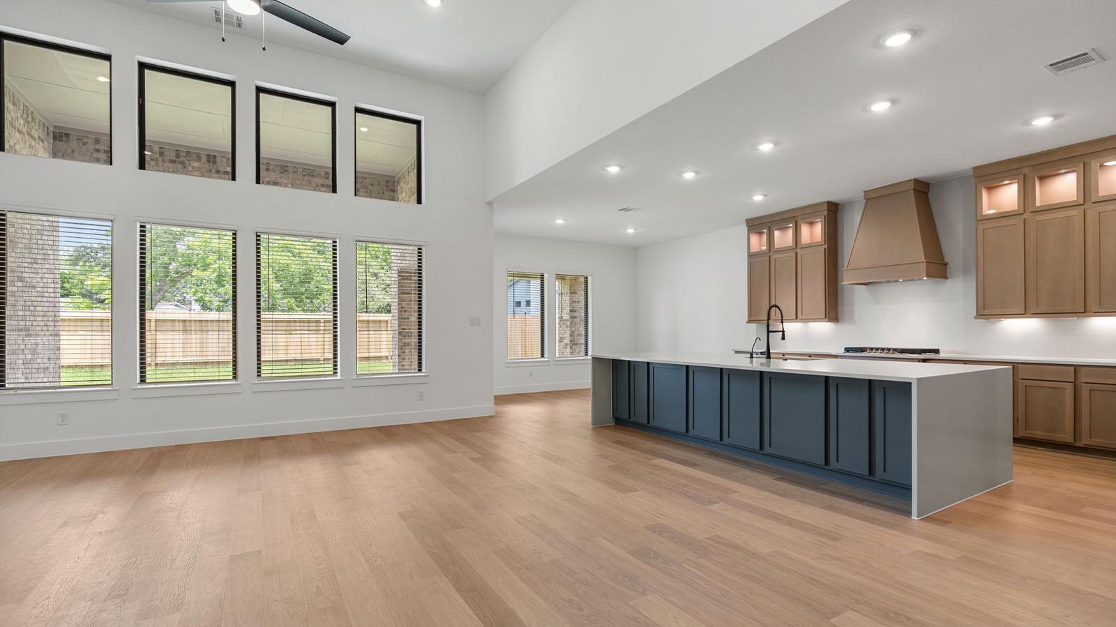 living room with multiple large windows