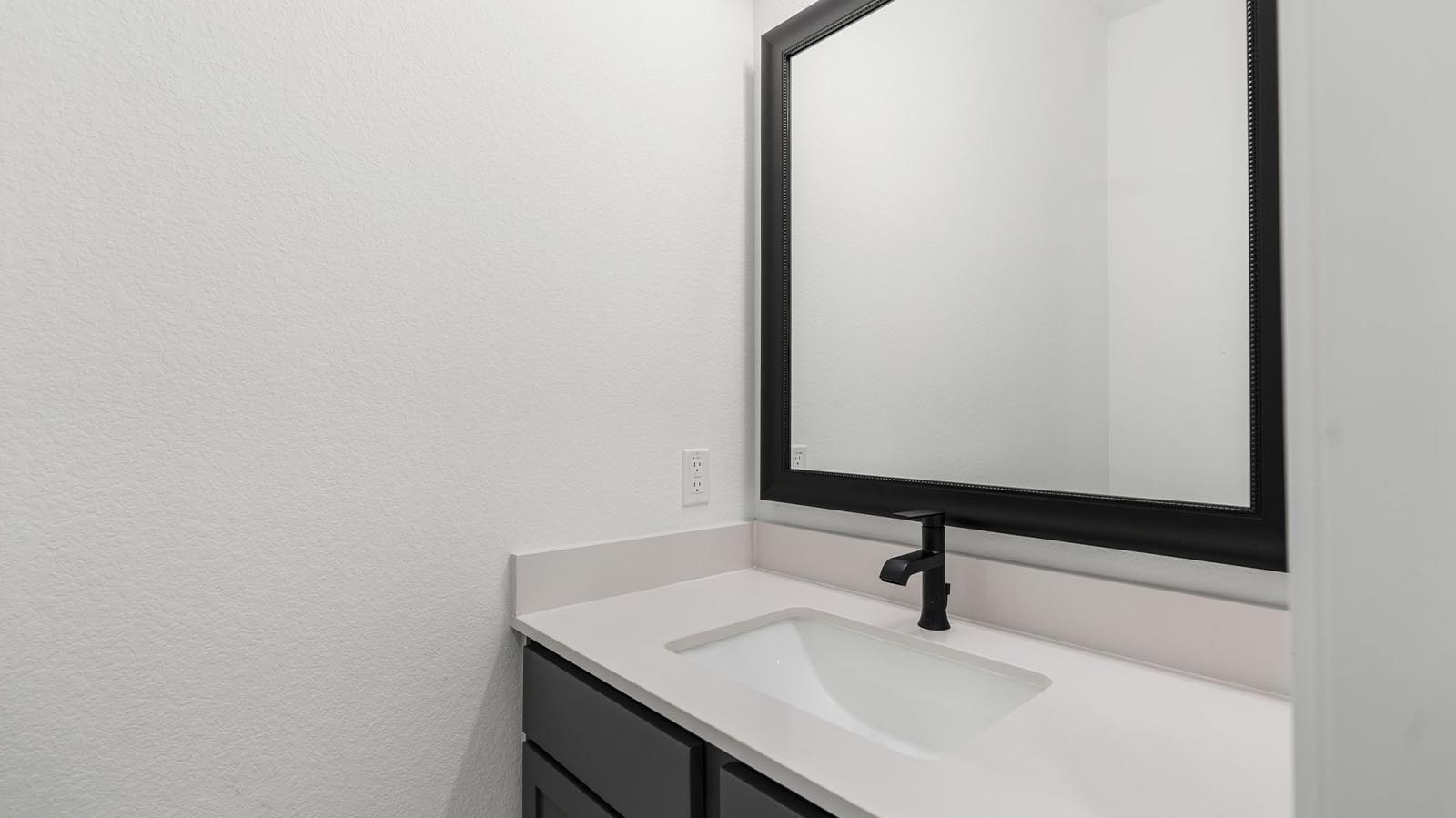 The decorate half bathroom downstairs for visiting guests