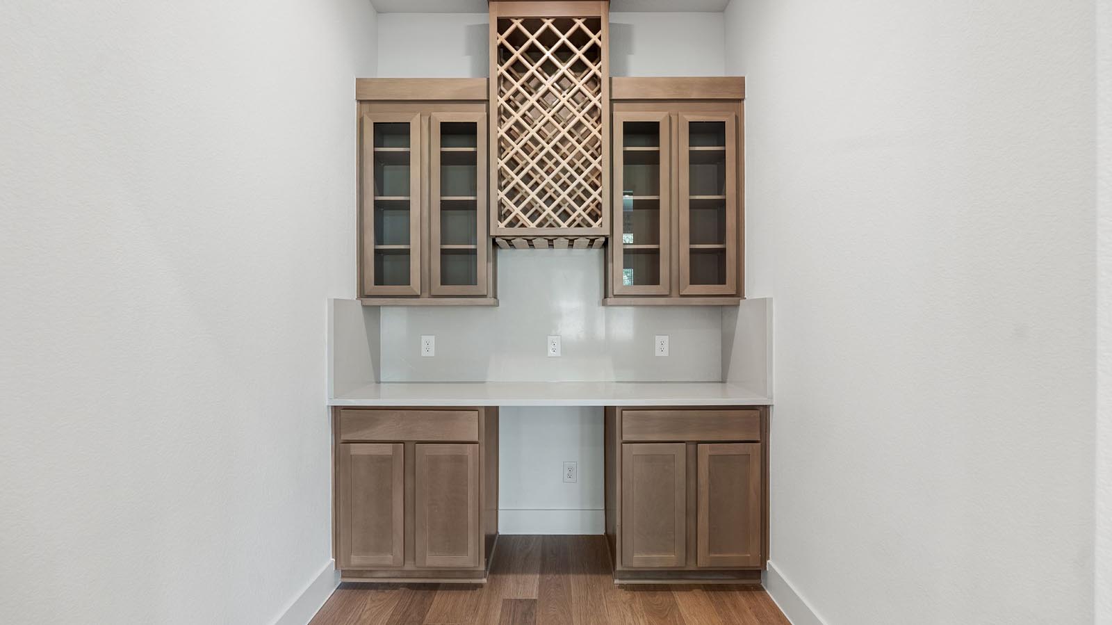 Dry bar area off the kitchen for social gatherings and additional space for a game room or breakfast nook