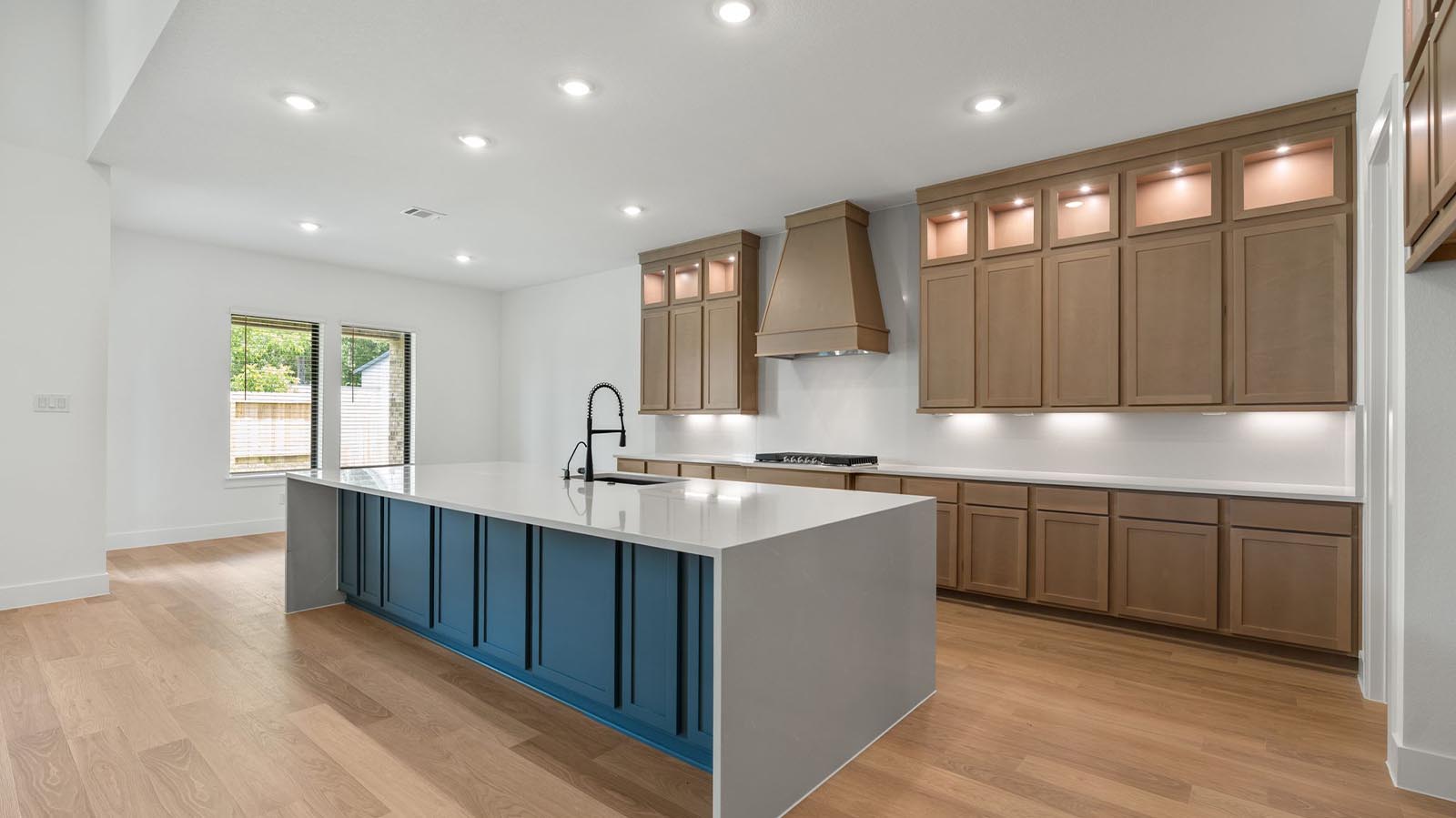 open concept kitchen with many cabinets