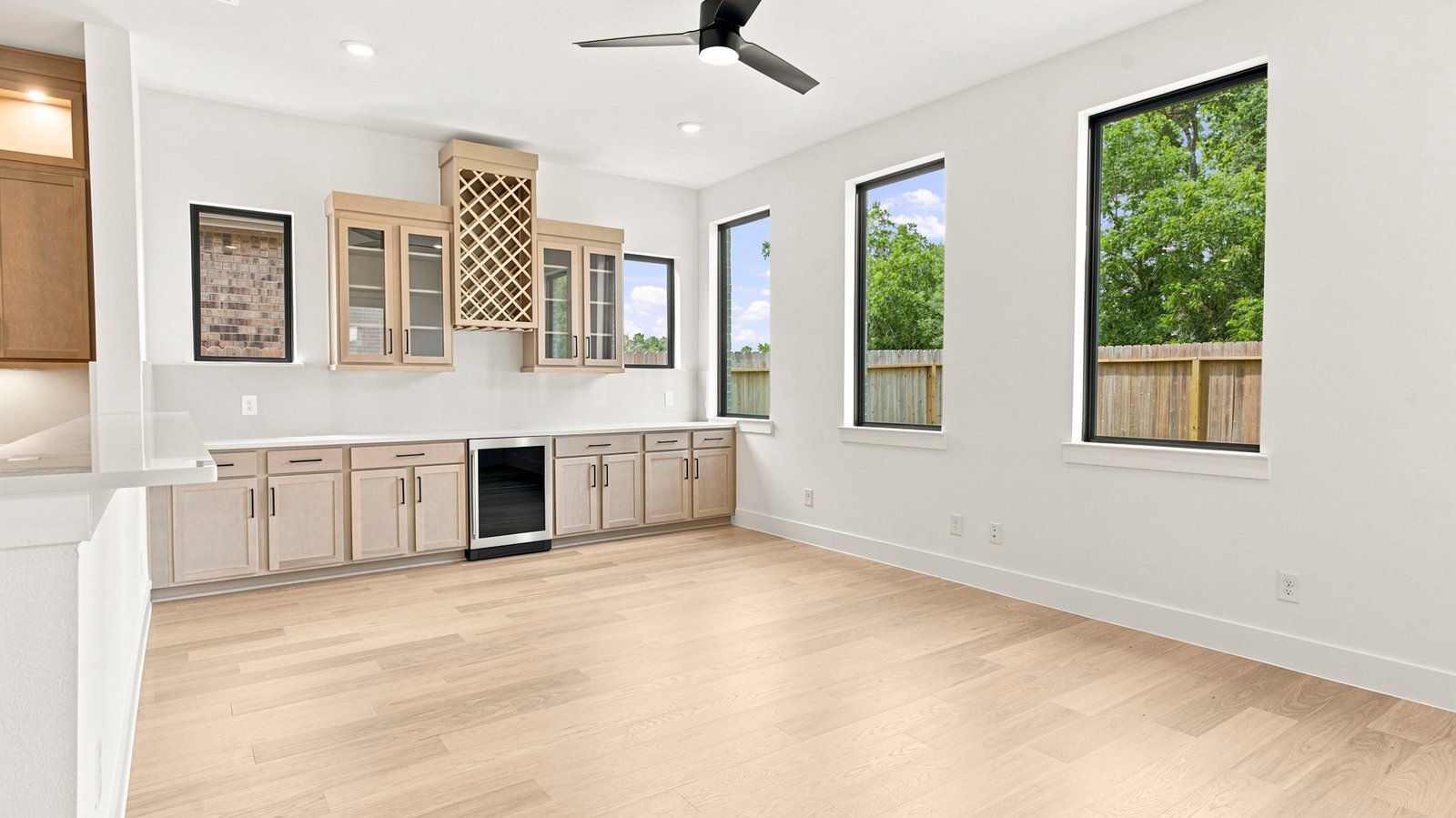 A beverage bar off the living room for social gatherings and additional storage.