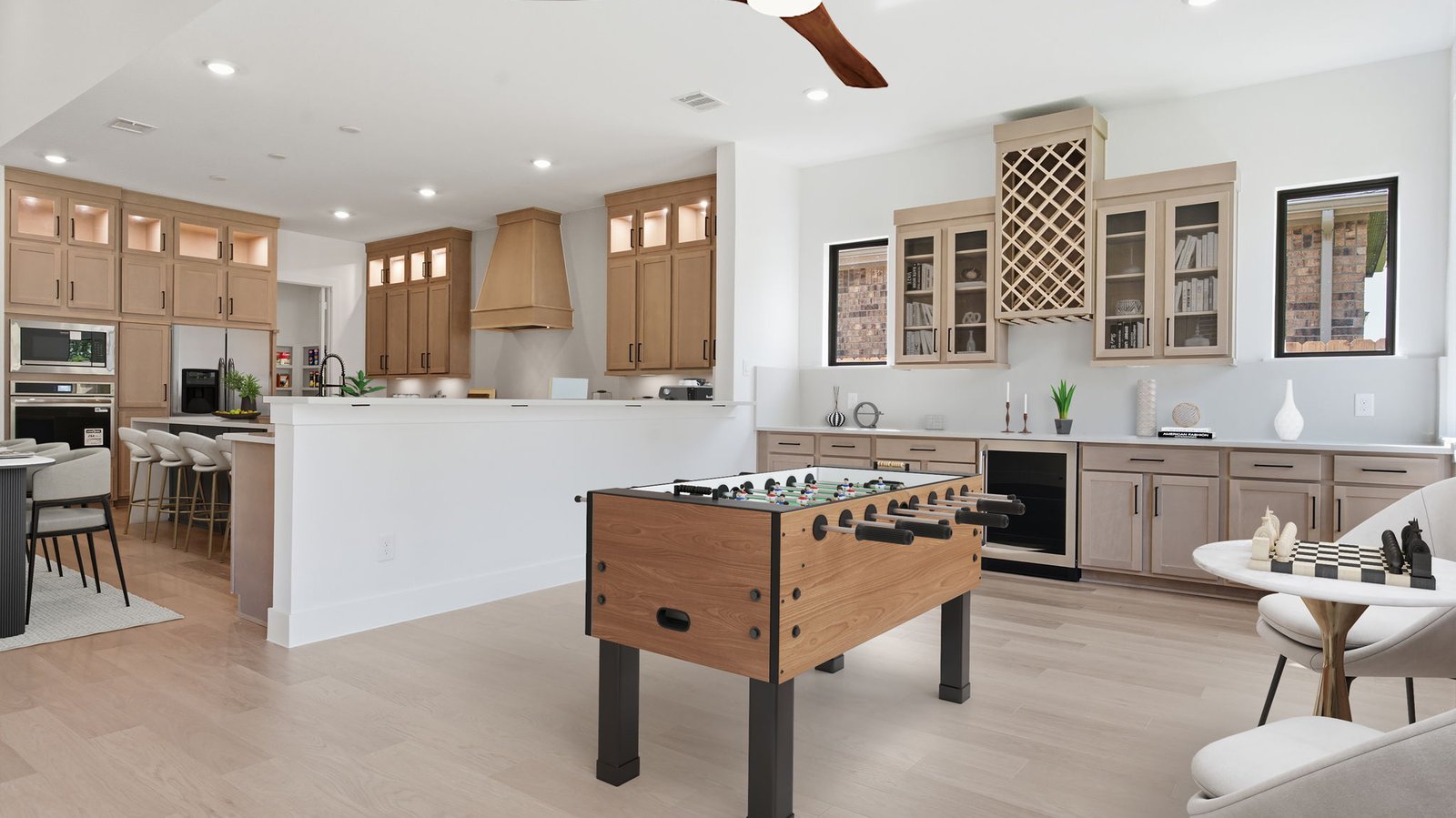 A beverage bar off the living room for social gatherings and additional space for a game room or breakfast nook
