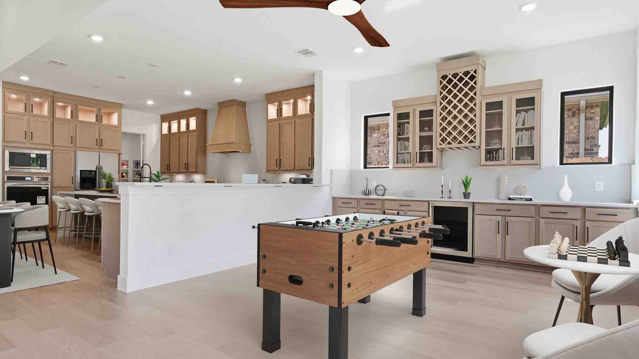 A beverage bar off the living room for social gatherings and additional space for a game room or breakfast nook