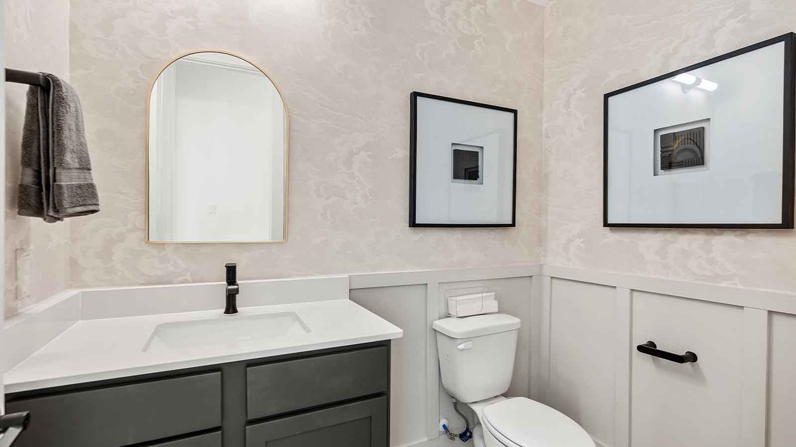 The decorate half bathroom downstairs for visiting guests
