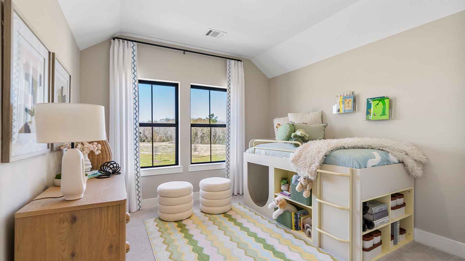 A fourth bedroom with one window, space that fits a queen size bed and additional bedroom furniture