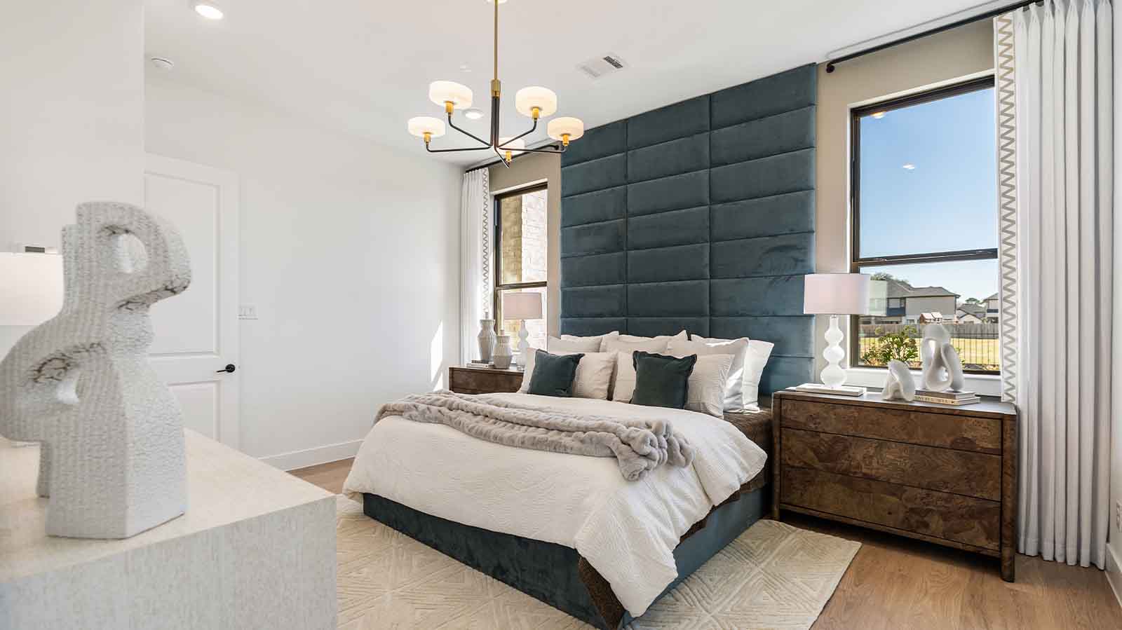 primary bedroom with two windows