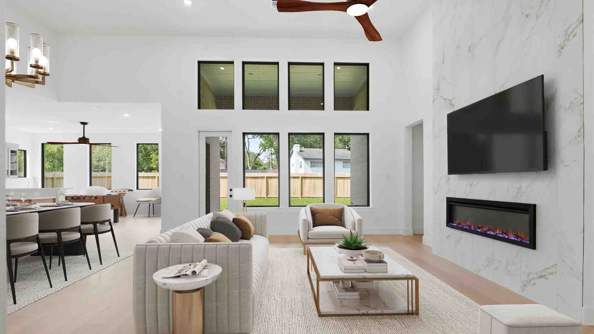 gorgeous living room with a electric fire place and room for a large couch, a coffee table and additional seating