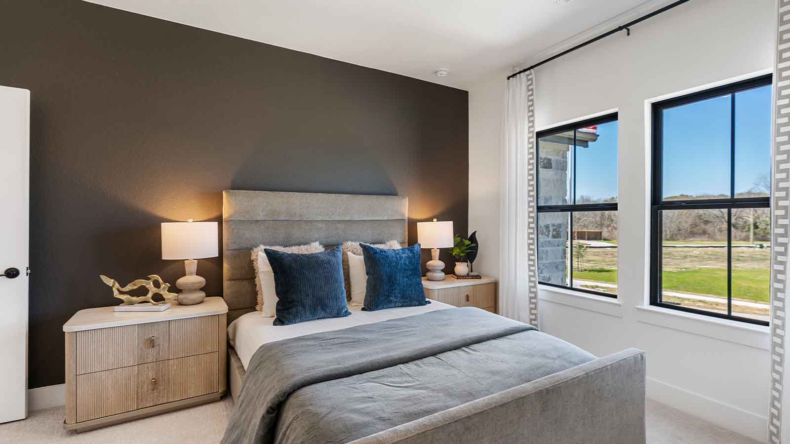 secondary bedroom with two windows