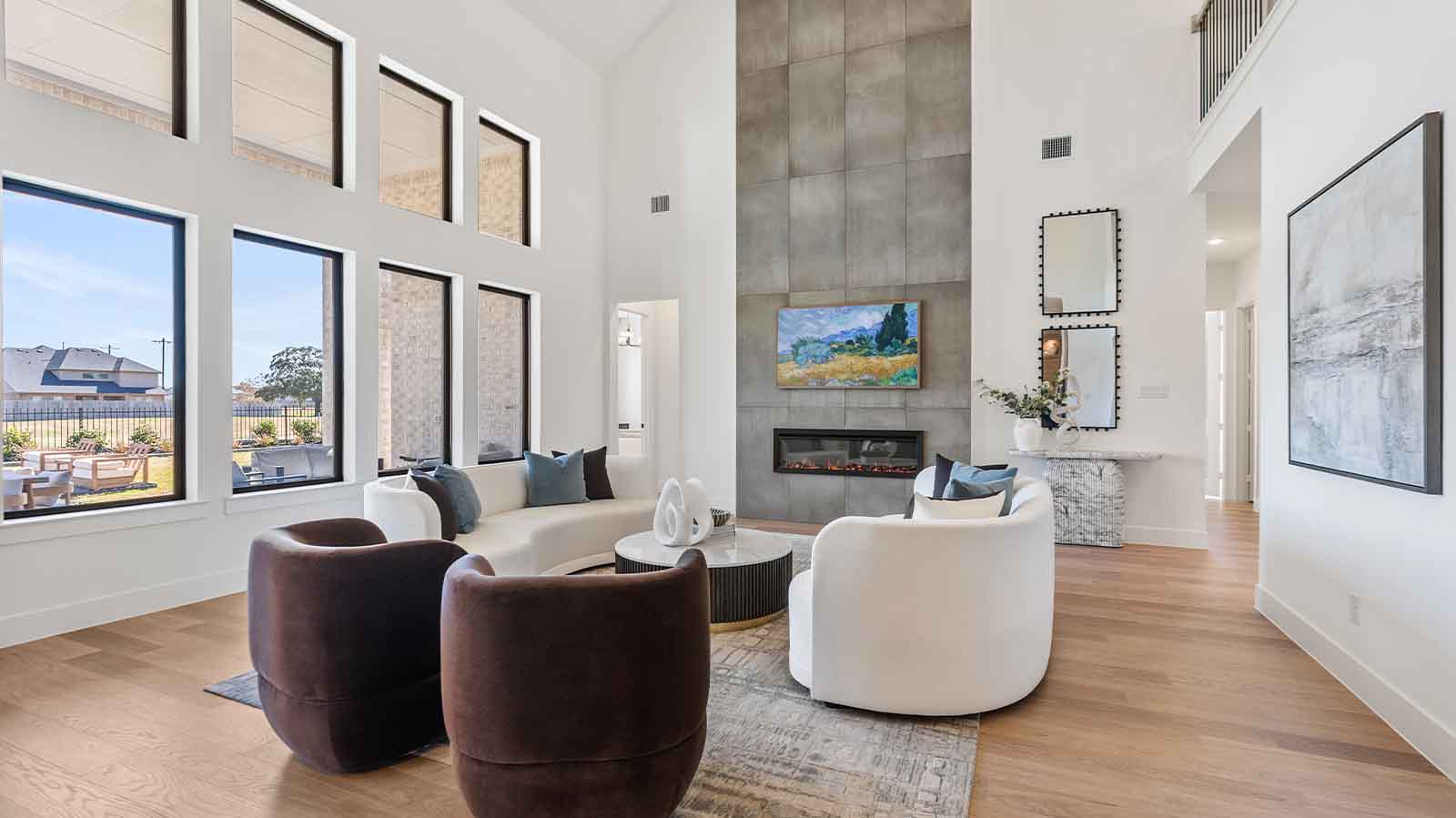 living room with tall ceilings and fireplace