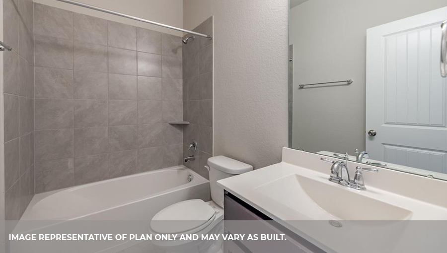 Secondary bathroom vanity with one sink and a bathtub and shower combo