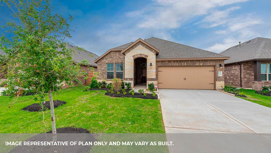 Single story brick home with a two car garage