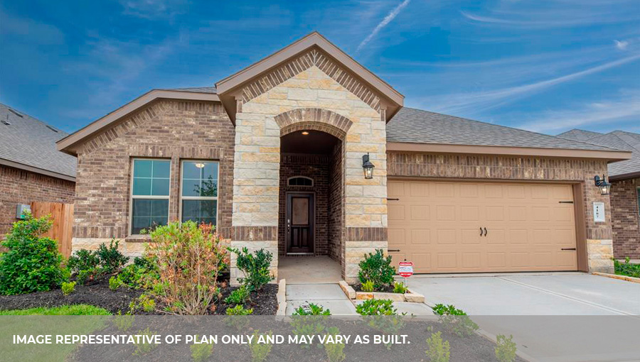 Single story brick home with a two car garage