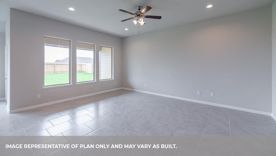 Spacious living room with tree large windows