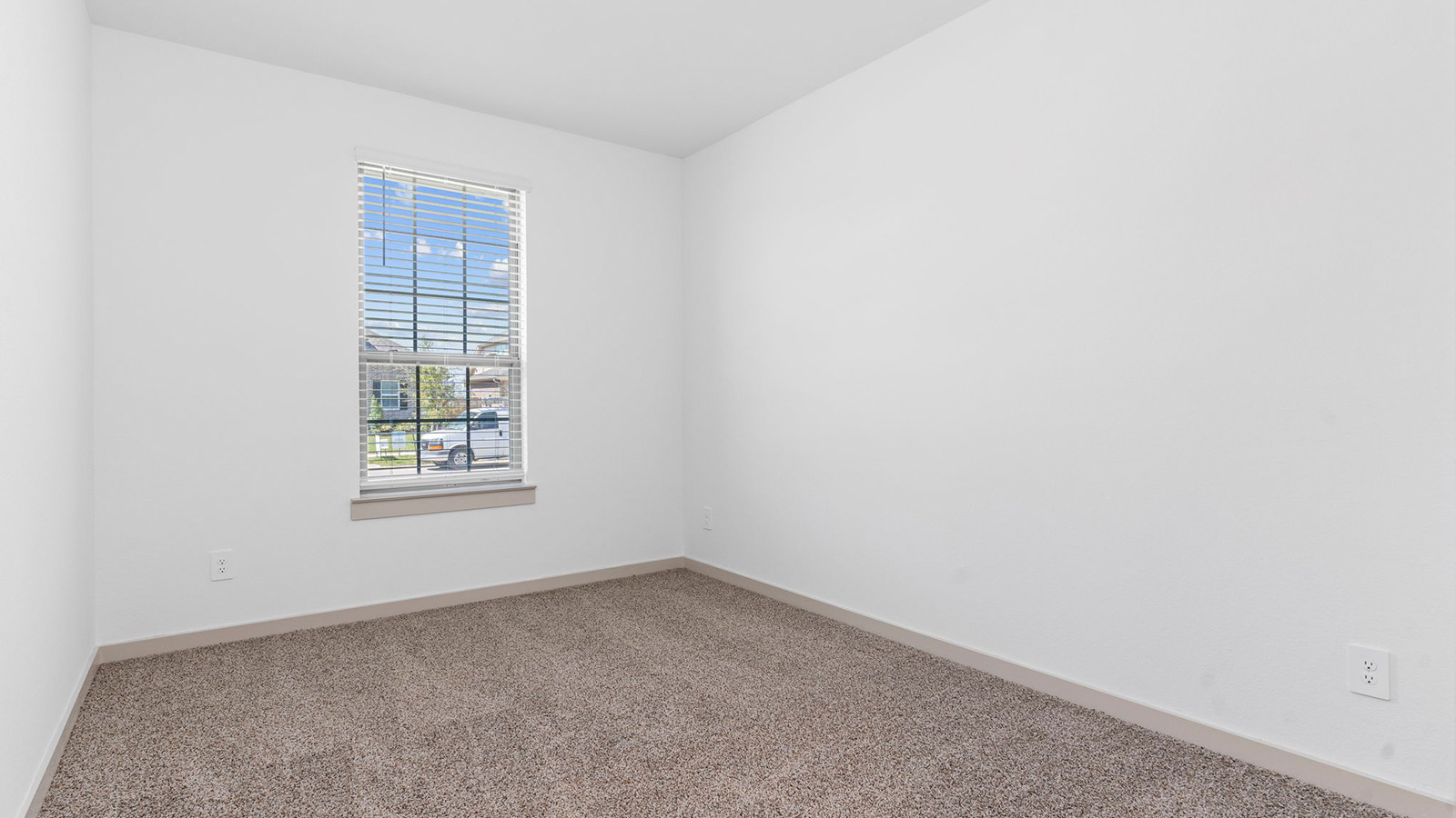 Secondary bedroom with one large window