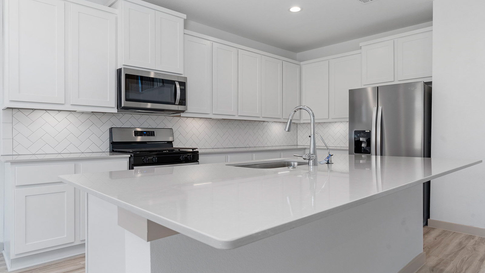 Large kitchen island with a deep sink