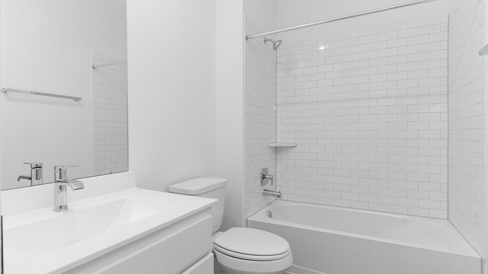 Secondary bathroom with bathtub and shower combo