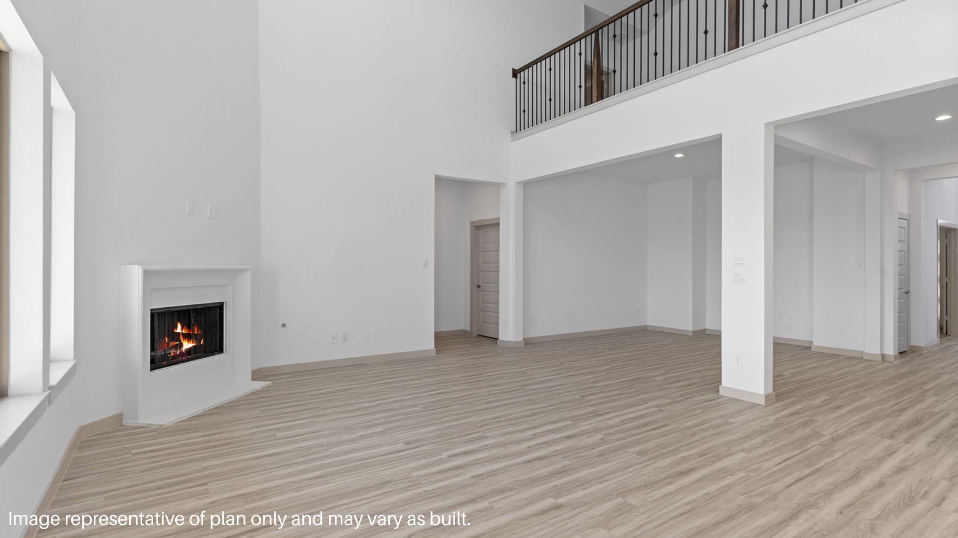 Spacious family room view with tall ceilings.