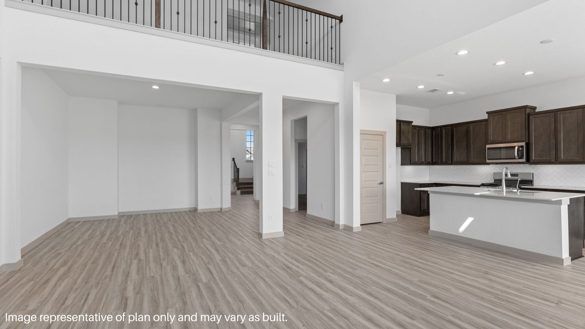 Spacious family room view with tall ceilings.