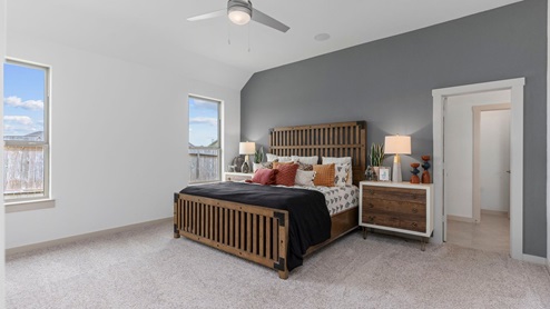 Primary bedroom with two windows