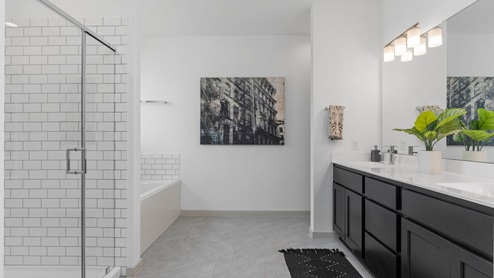 Primary bathroom vanity with two sinks