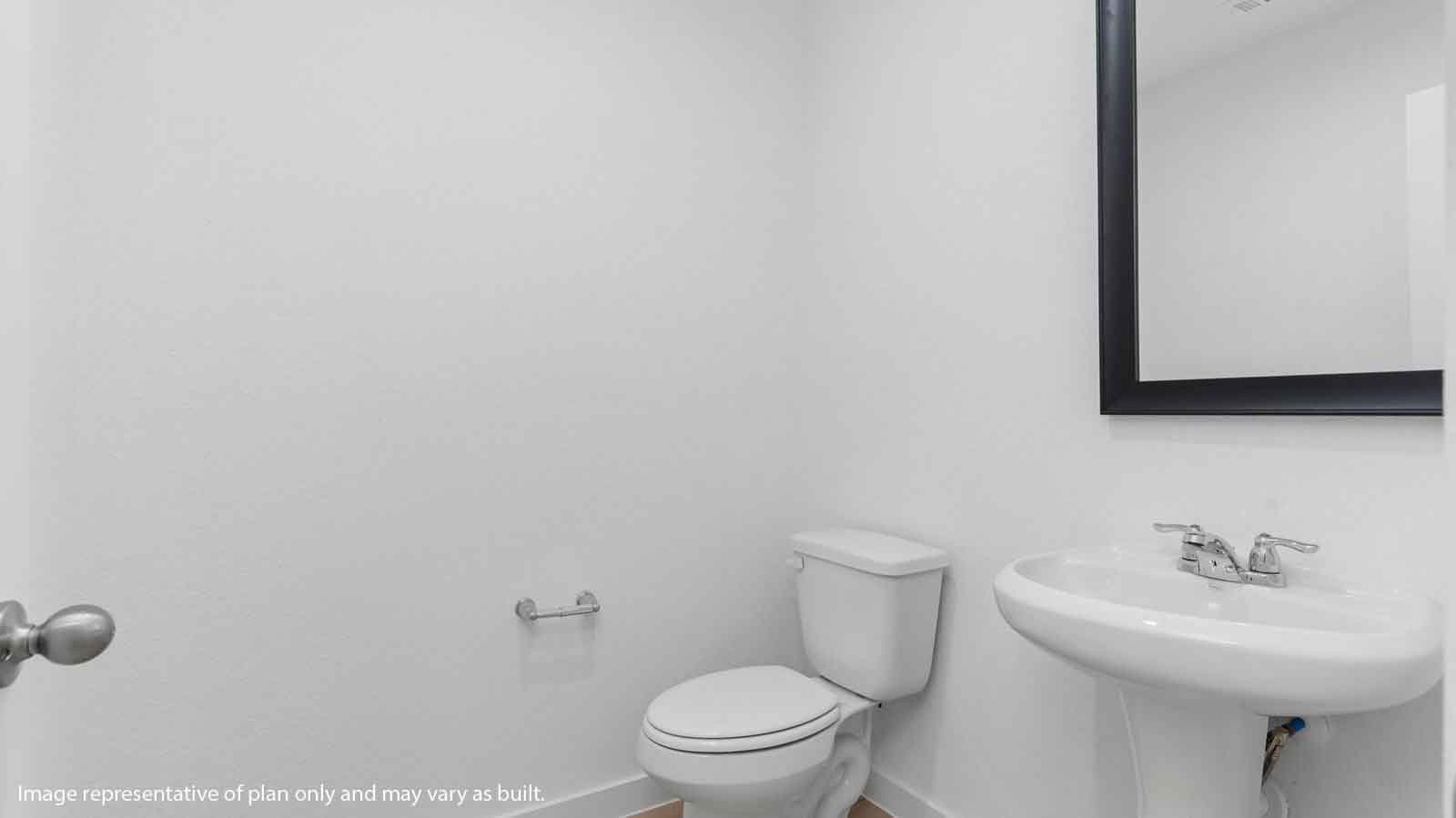 Half bath with one sink and a large mirror