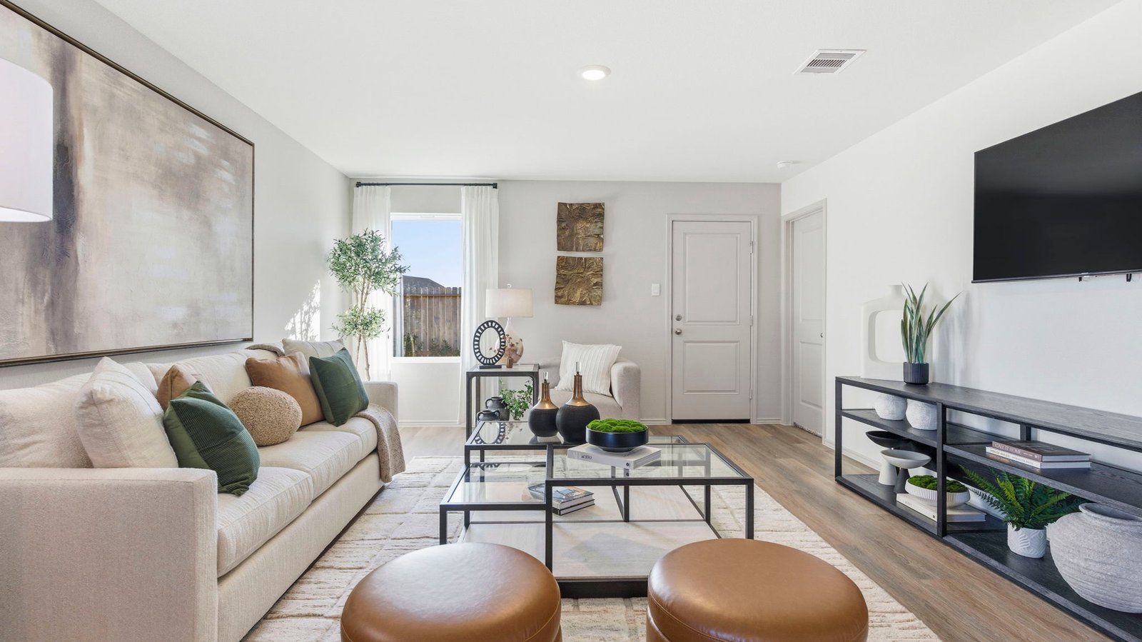 living room with one window and back patio door