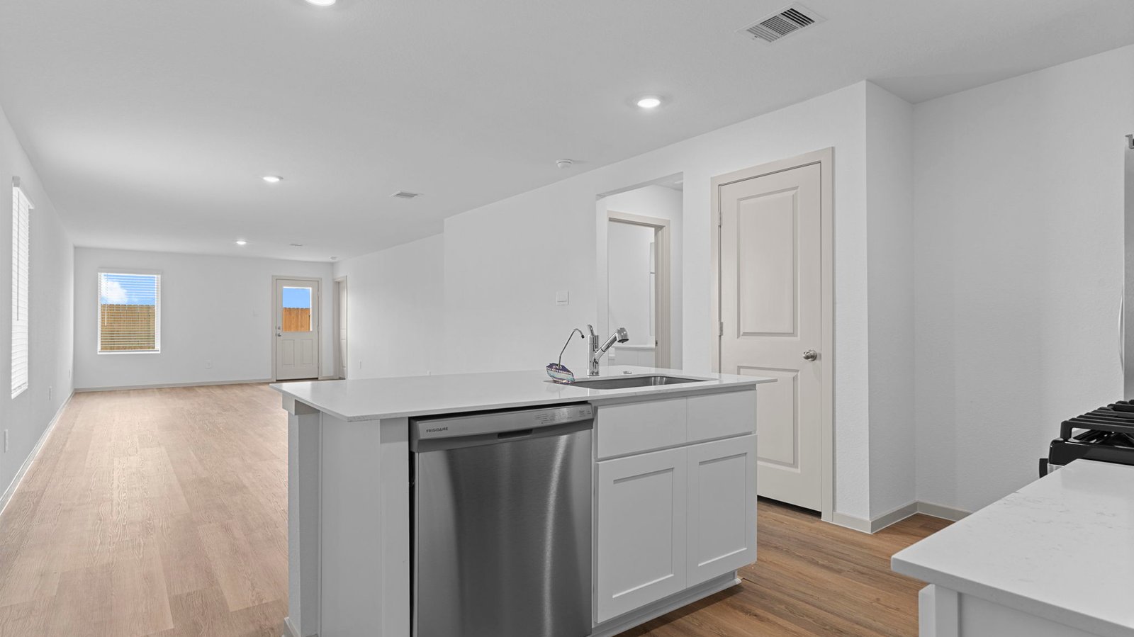 open concept kitchen, dining, and living room