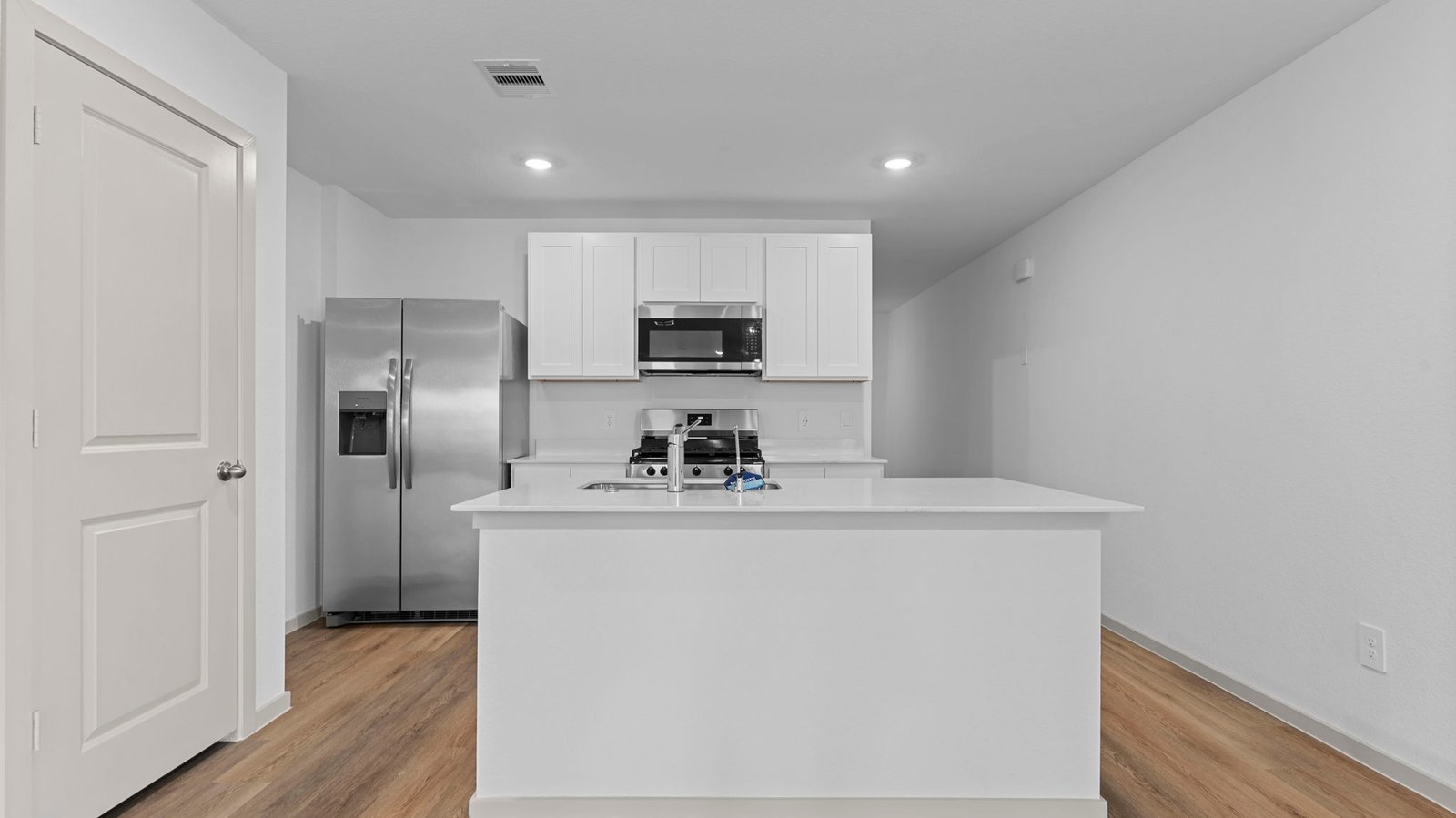 kitchen with island and walk in pantry