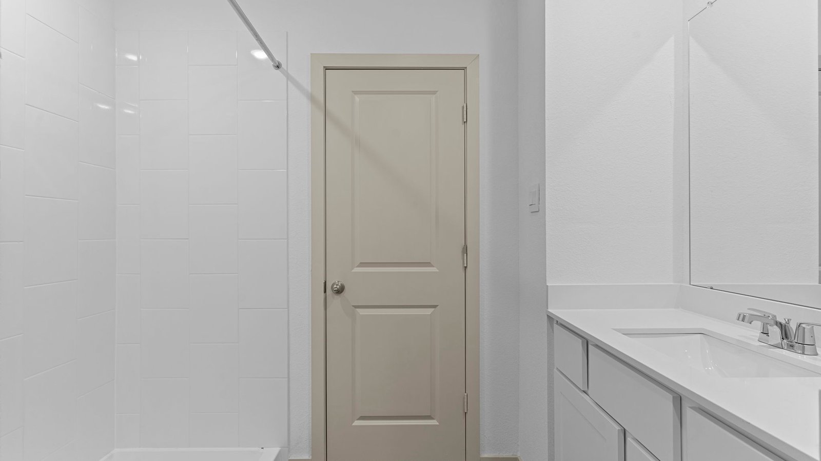 primary bathroom with one sink and stand up shower