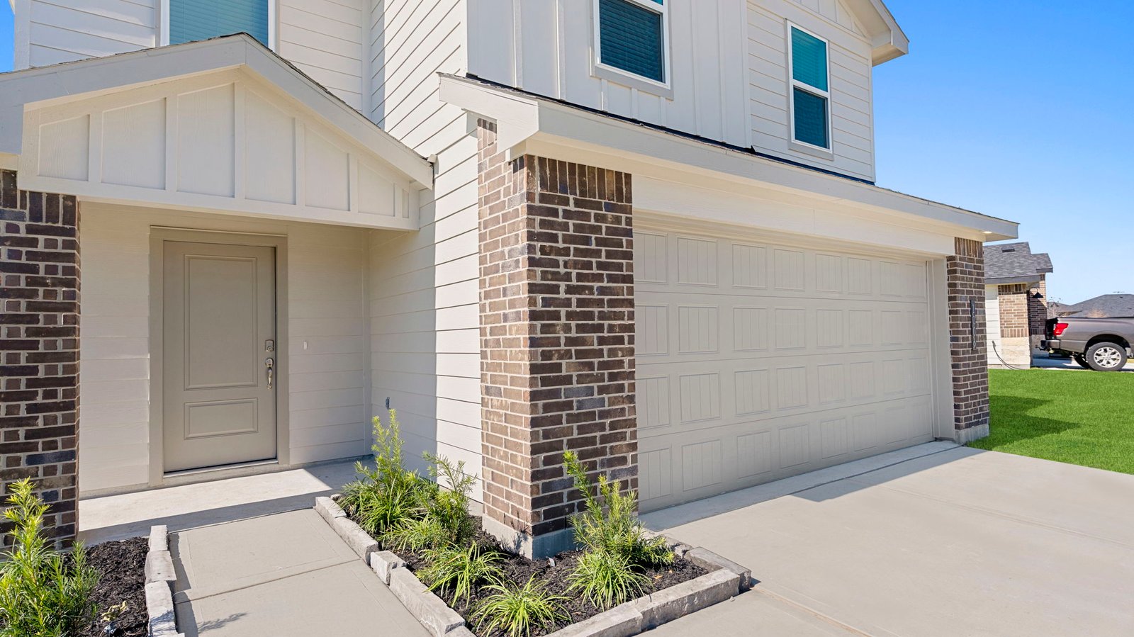 two story home with a two car garage