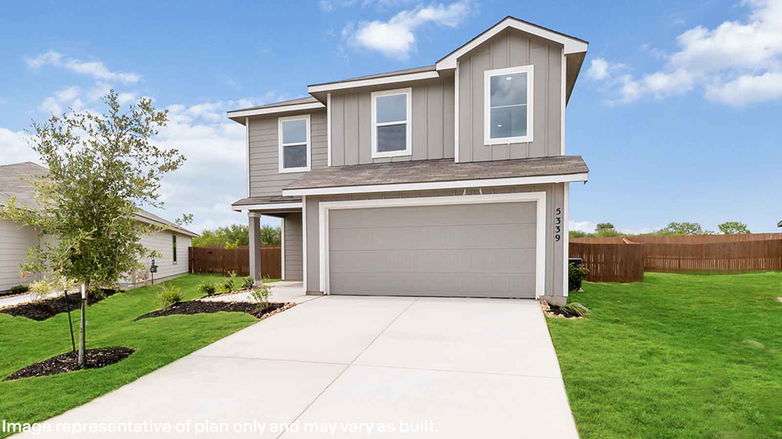 two story home with a two car garage