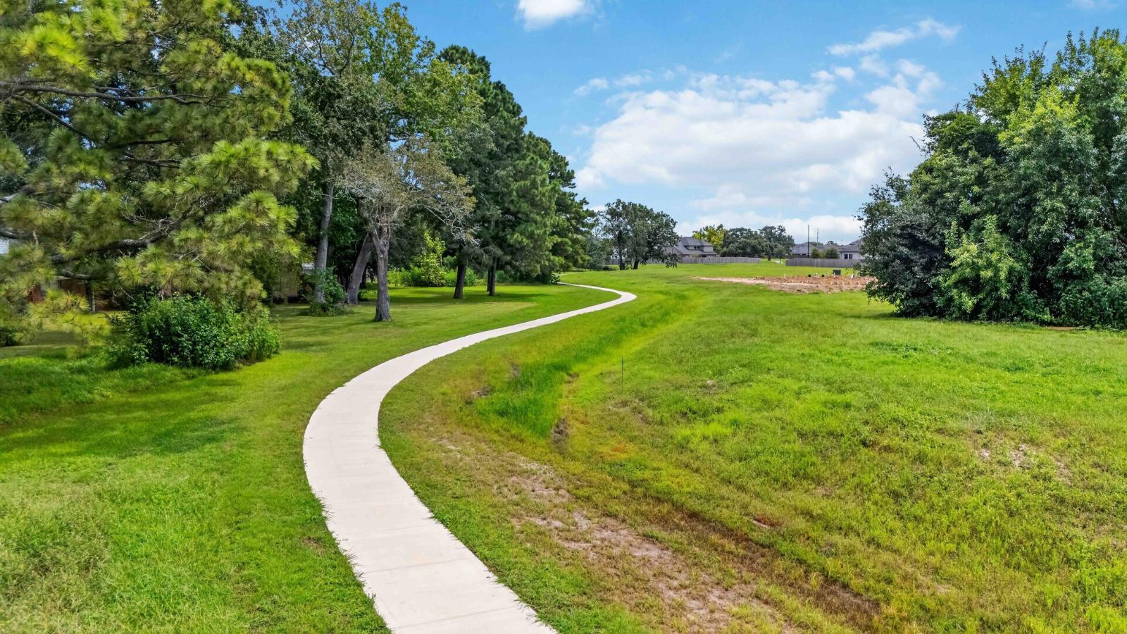 community walking trails with beautiful trees and greenery