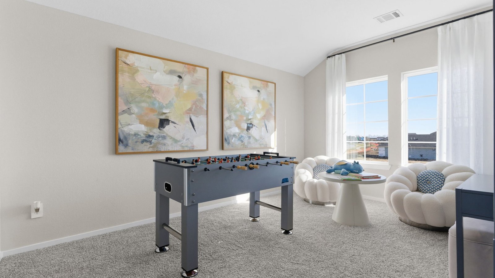 game room with large window