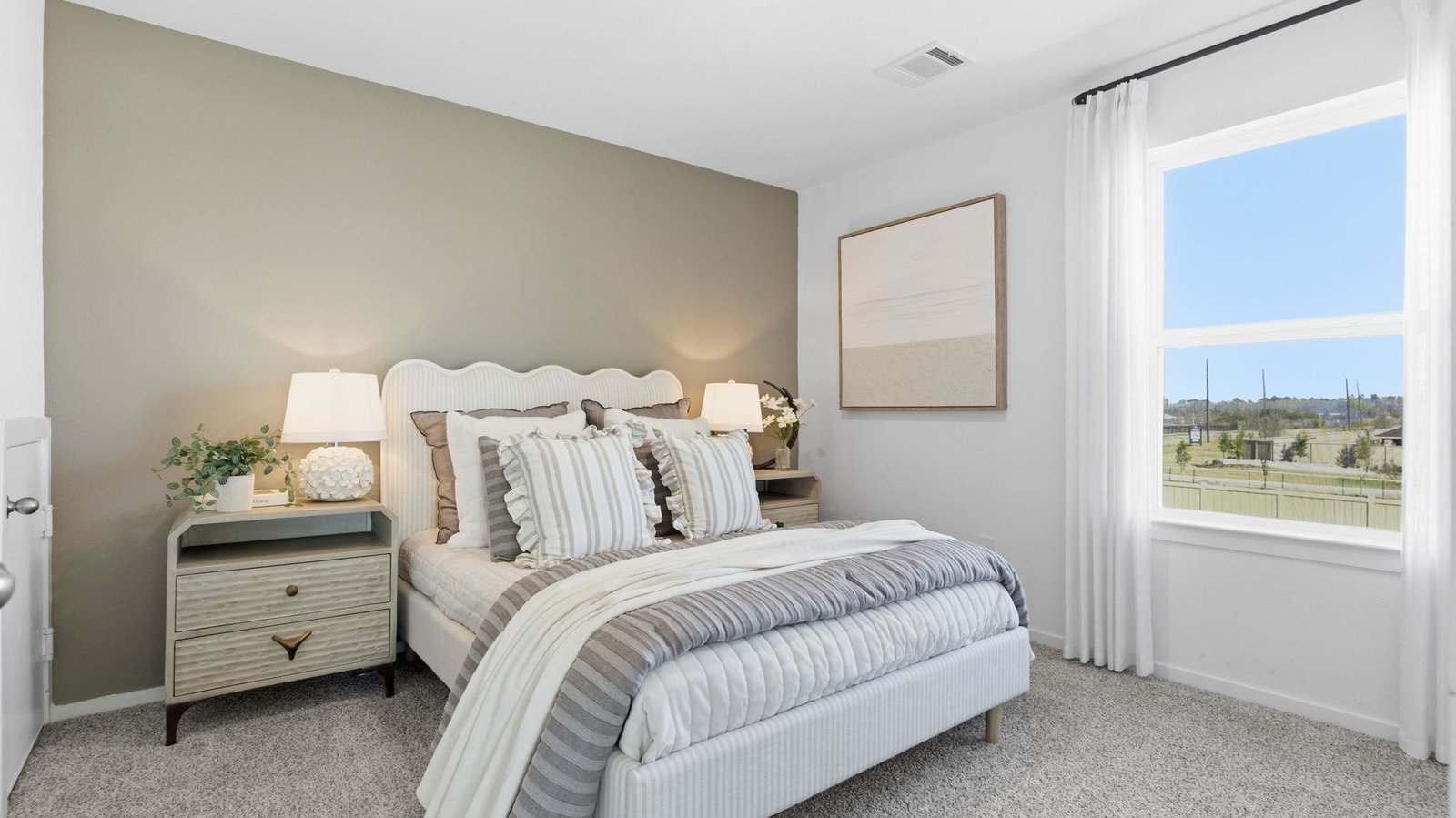 secondary bedroom with large window