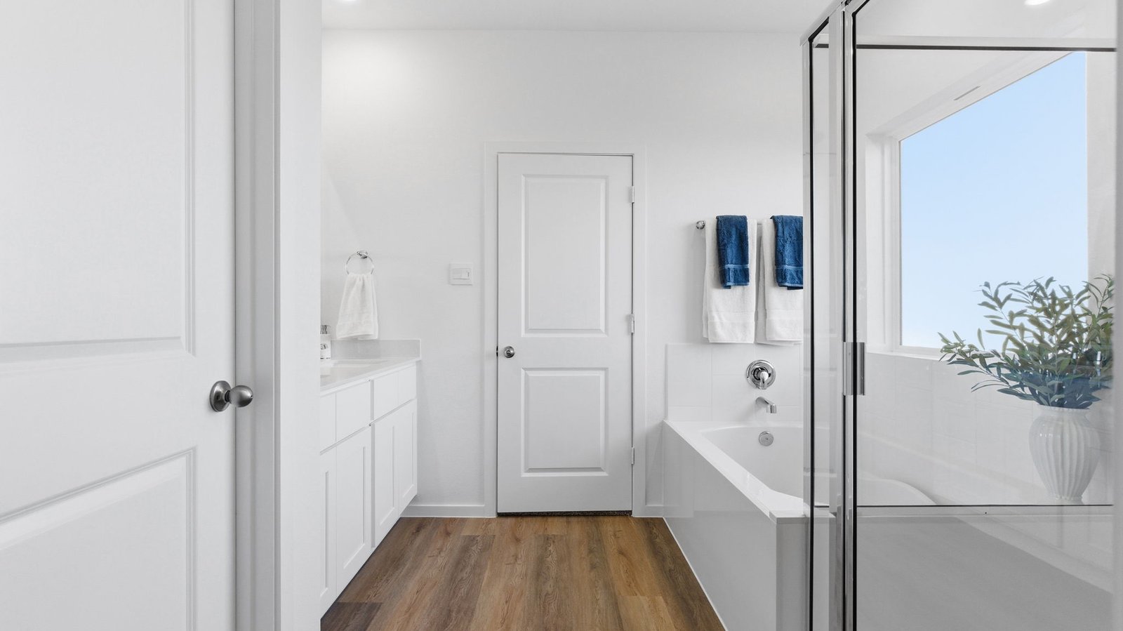 primary bathroom with large window