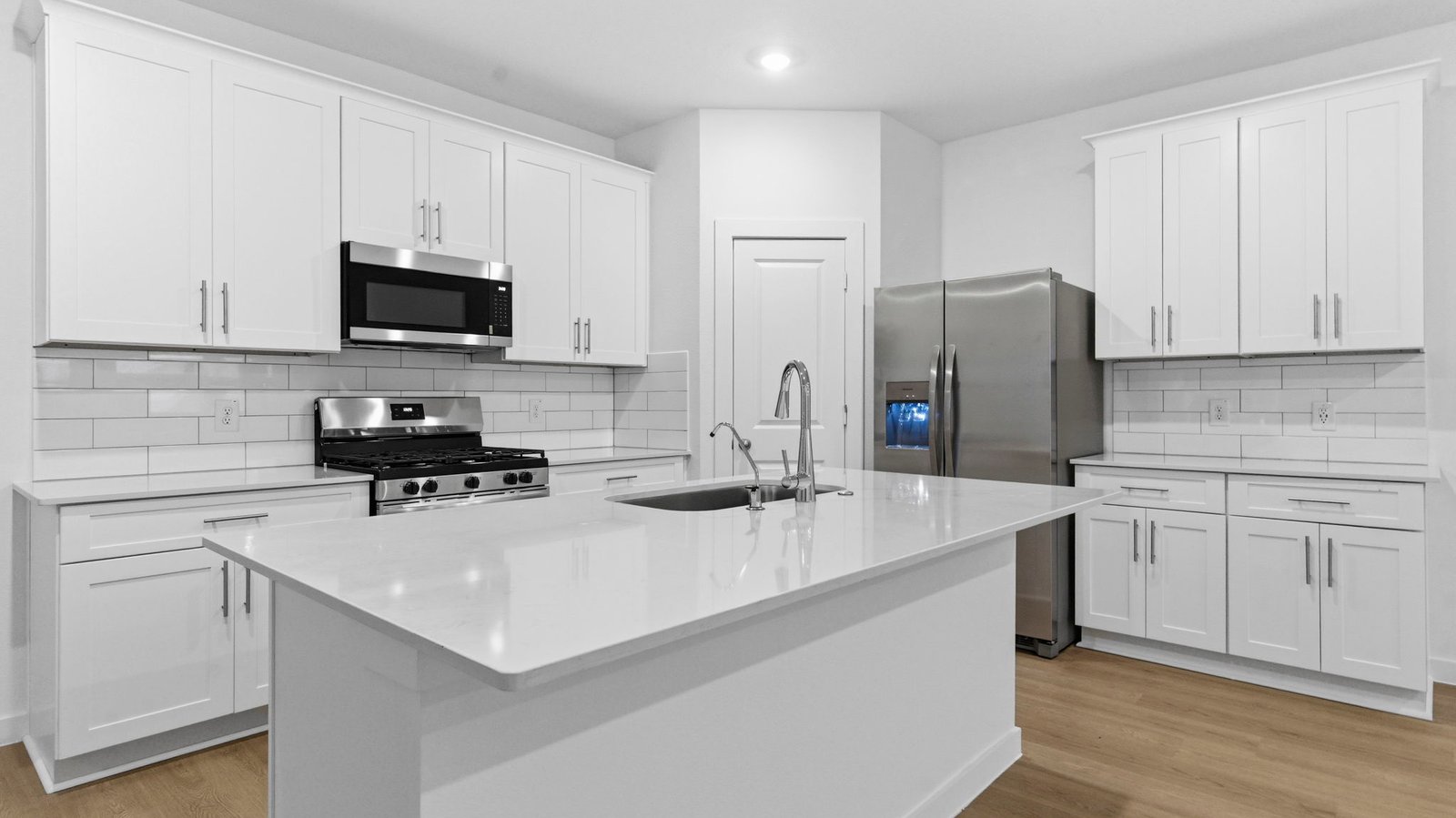 kitchen with large island and walk in pantry