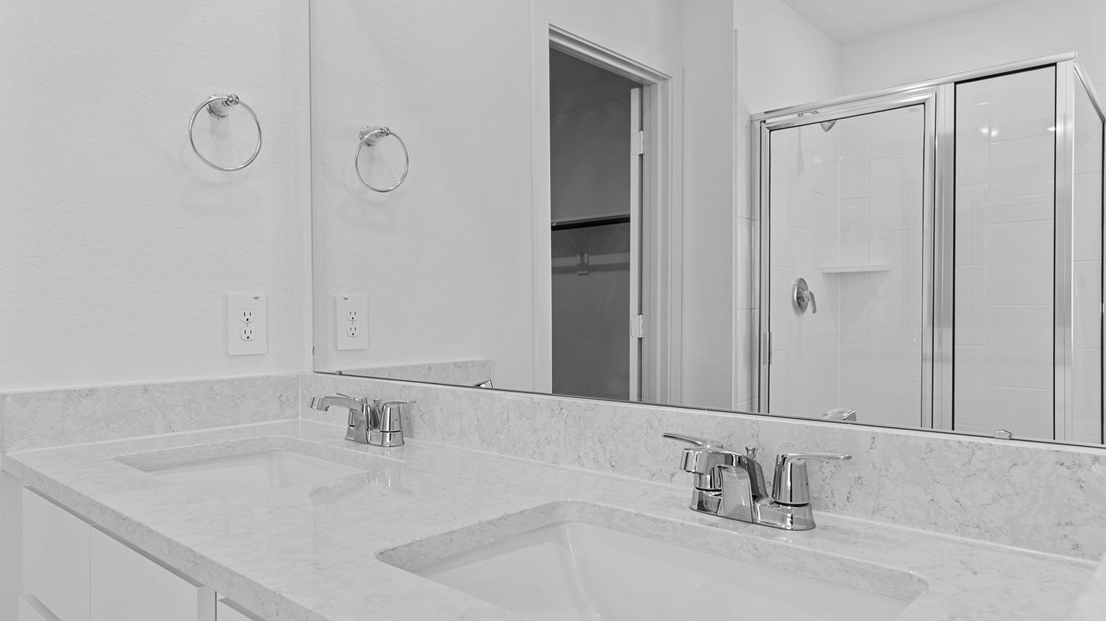 primary bathroom vanity with two sinks