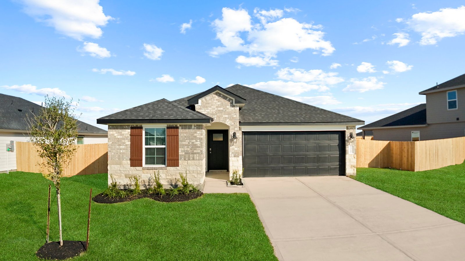 single story home with a two car garage