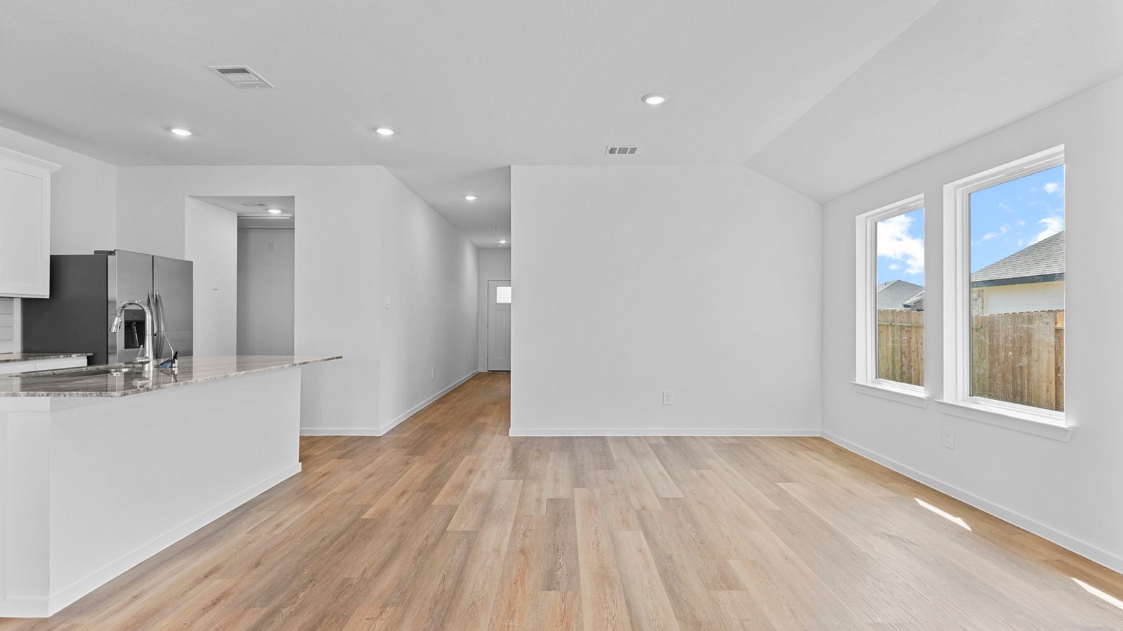 open concept dining room with large window