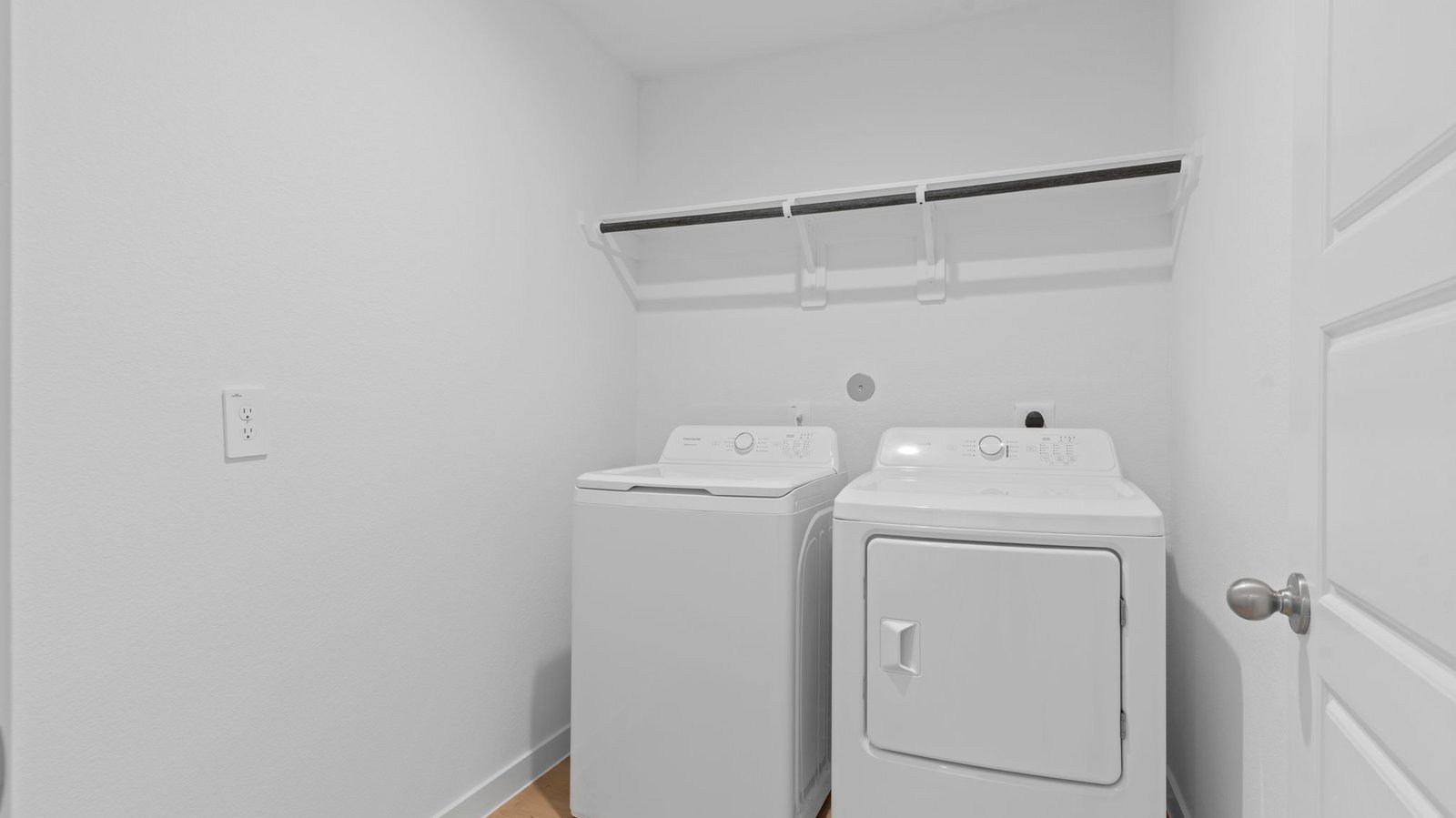 laundry room with side by side washer and dryer