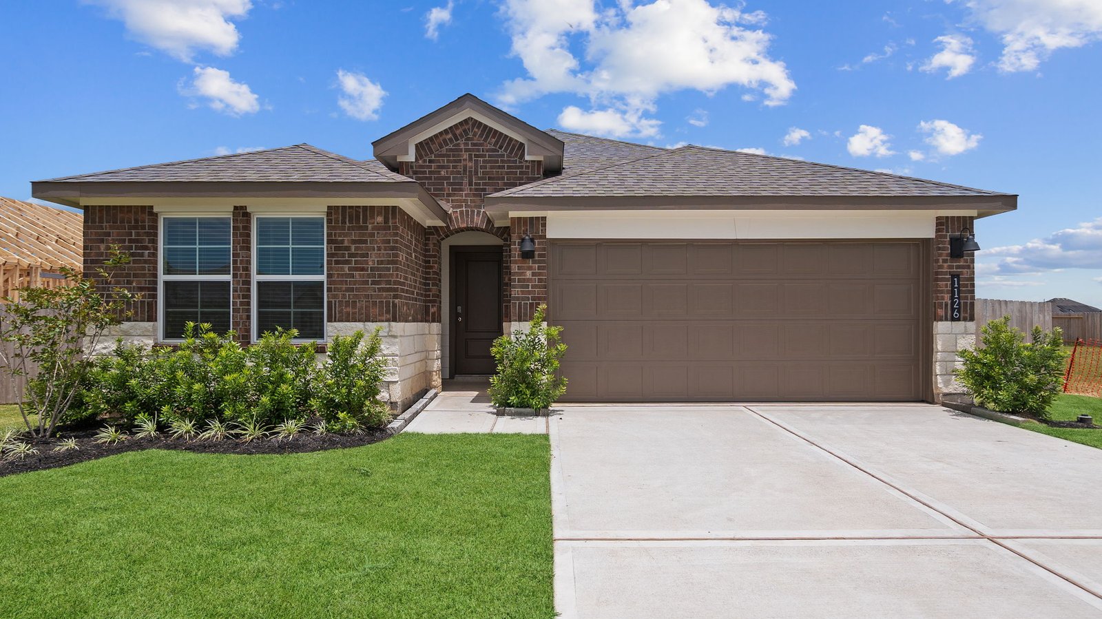 single story home with a two car garage